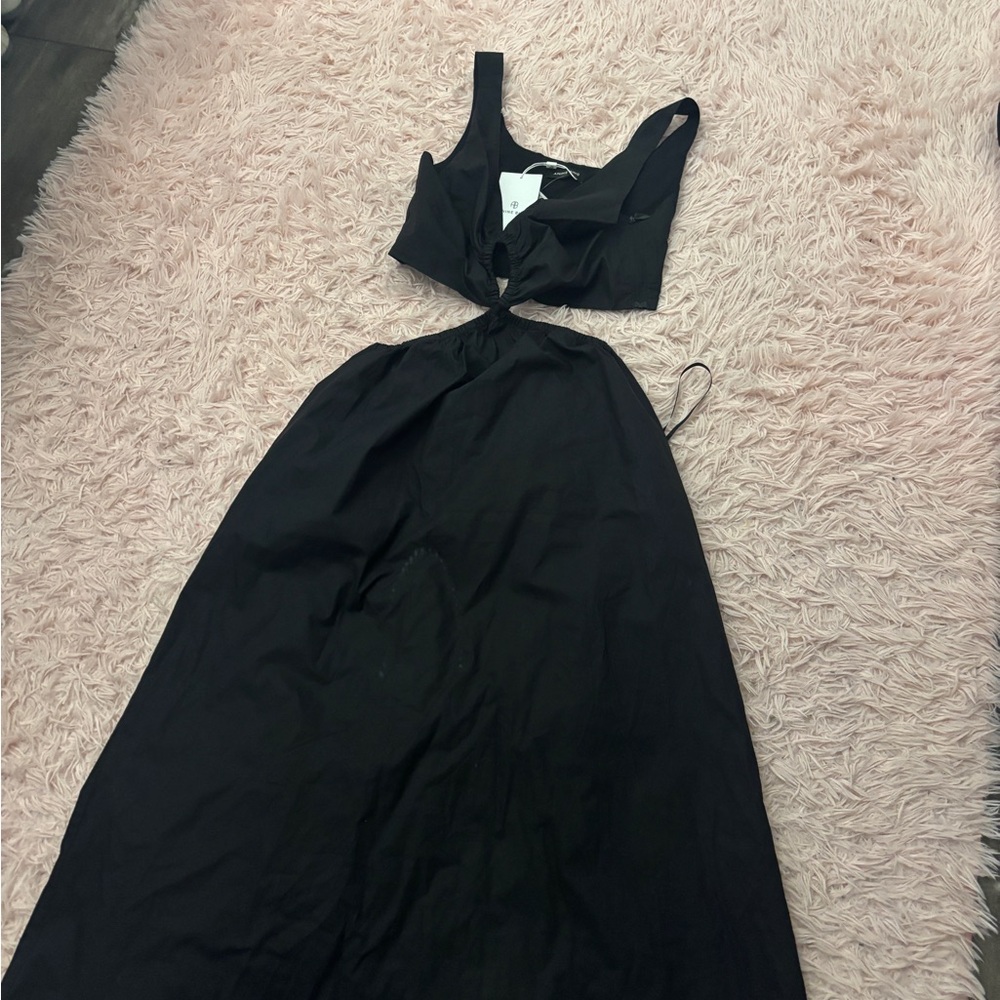 Women’s S dress NWT. Has a little flaw, idk if u can get it off but u can try